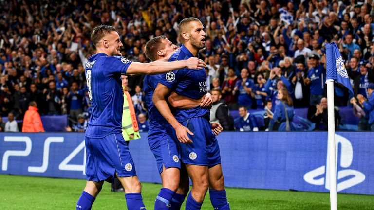 Islam Slimani celebrates with team-mates after scoring their first goal against FC Porto