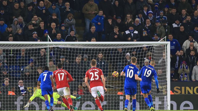 Islam Slimani scores from the penalty spot to equalise for Leicester