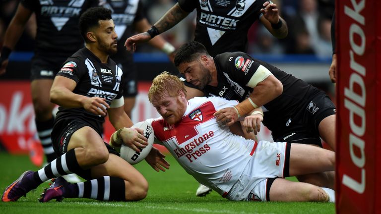 HUDDERSFIELD, ENGLAND - OCTOBER 29:  James Graham of England is tackled just short of the try line during the Four Nations match between the England and Ne