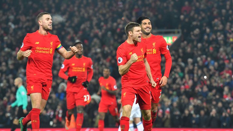 Liverpool's James Milner celebrates scoring his side's second goal from the penalty spot