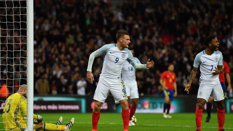 Jamie Vardy of England (9) celebrates with Raheem Sterling (7) as he scores their second goal 