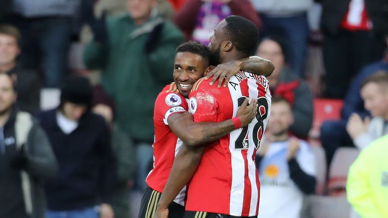 Jermain Defoe celebrates his goal with team-mate Victor Anichebe