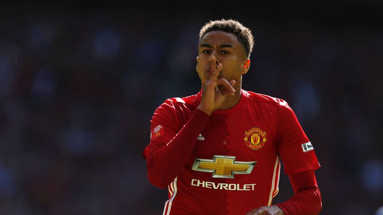 Manchester United's English midfielder Jesse Lingard celebrates scoring the opening goal during the FA Community Shield football match between Manchester U