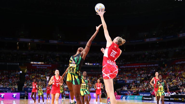 Joanne Harten of England is challenged by Stacian Facey of Jamaica during the 2015 Netball World Cup match