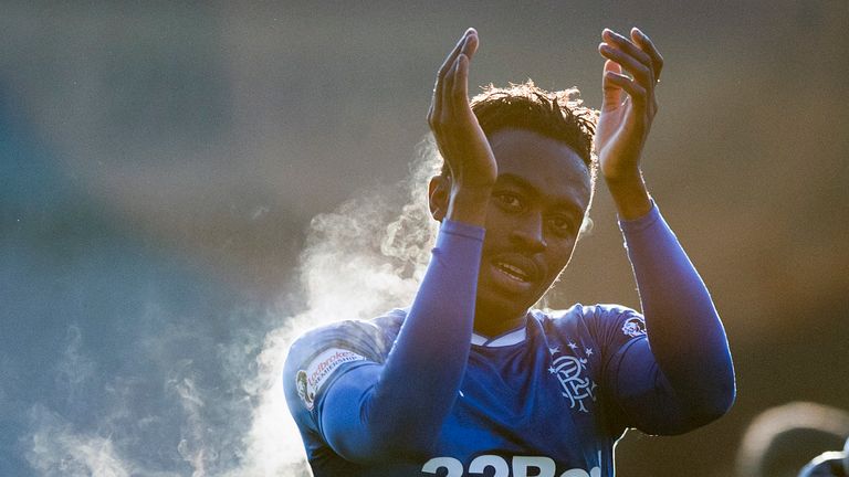 Dodoo applauds the Rangers fans after his late match-winning brace at Firhill