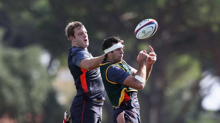 Josh Beaumont (R)Joe Launchbury (L) compete in the air l during a England training session