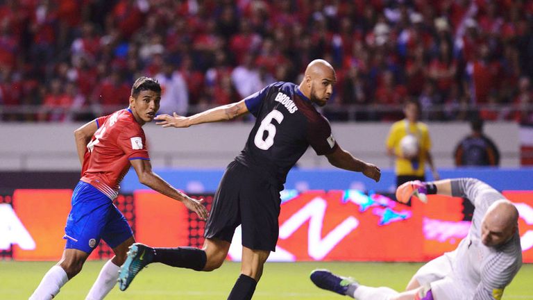 Johan Venegas (L) scores for Costa Rica against USA