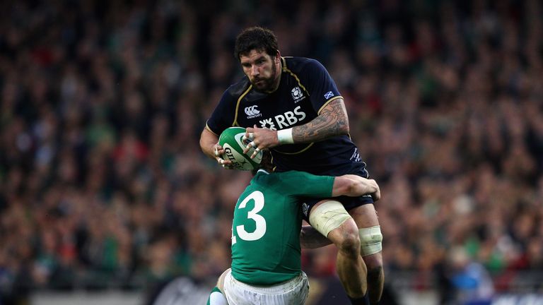 DUBLIN, IRELAND - MARCH 10:  John Barclay of Scotland is tackled by Keith Earls of Ireland during the RBS Six Nations match between Ireland and Scotland at