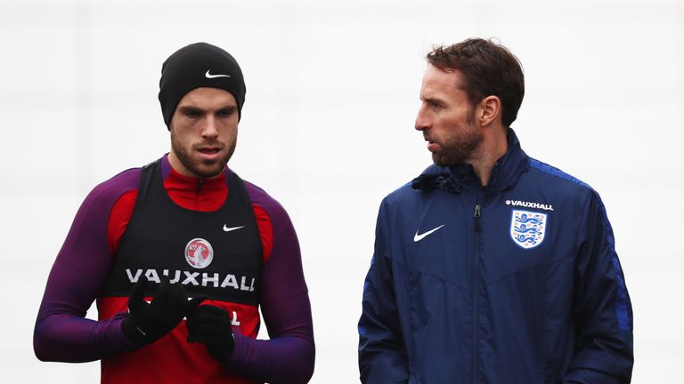 ENFIELD, ENGLAND - NOVEMBER 14:  Jordan Henderson and Gareth Southgate interim manager of England in discussion during an England training session on the e