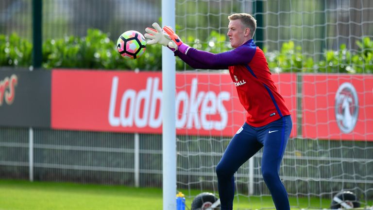 Jordan Pickford in action during an England training session at the Tottenham Hotspur training ground