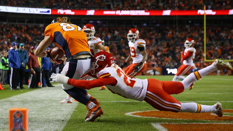 DENVER, CO - NOVEMBER 27:  Wide receiver Jordan Taylor #87 of the Denver Broncos catches a pass and taps his toes in the end zone for a touchdown in the th