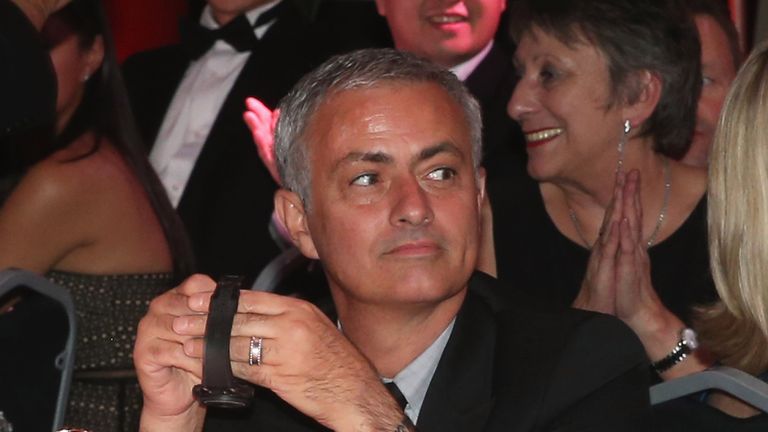 Jose Mourinho donates his watch for auction at the annual United for UNICEF dinner at Old Trafford