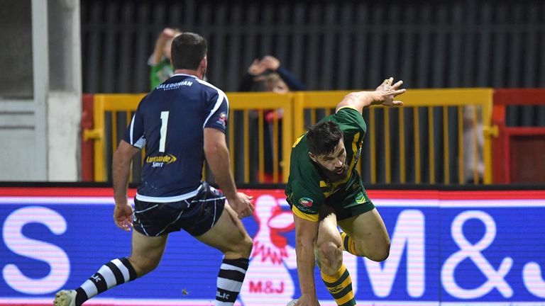 Josh Mansour touches down against Scotland
