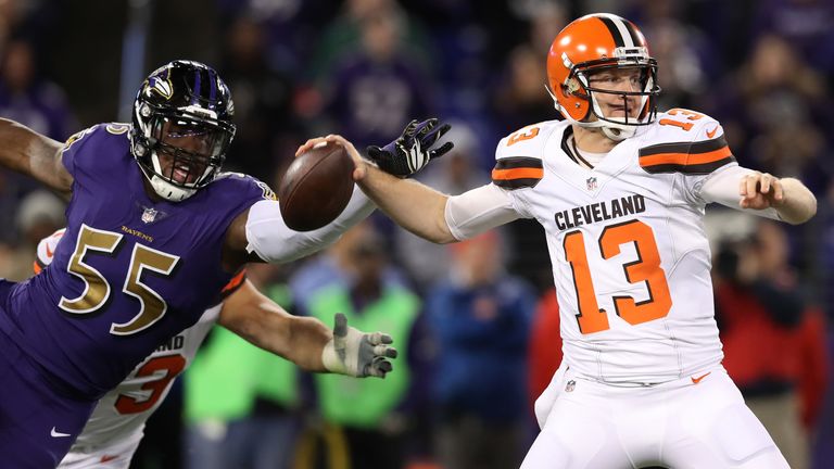 BALTIMORE, MD - NOVEMBER 10: Quarterback Josh McCown #13 of the Cleveland Browns works under pressure from outside linebacker Terrell Suggs #55 of the Balt