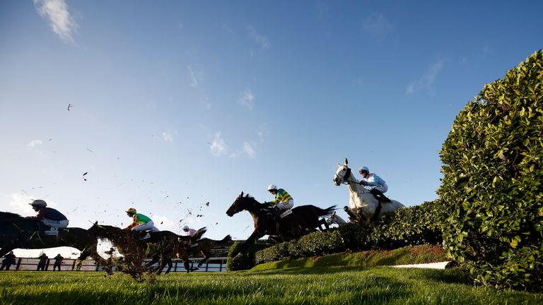 CHELTENHAM, ENGLAND - NOVEMBER 13:Nina Carberry riding Josies Orders (2R) on their way to winning The Glenfarclas Cross Country Steeple Chase at Cheltenham
