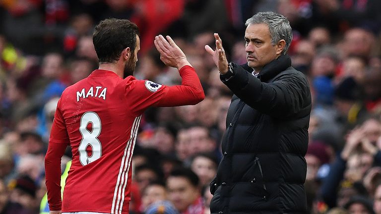 Jose Mourinho congratulates Juan Mata as leaves the pitch