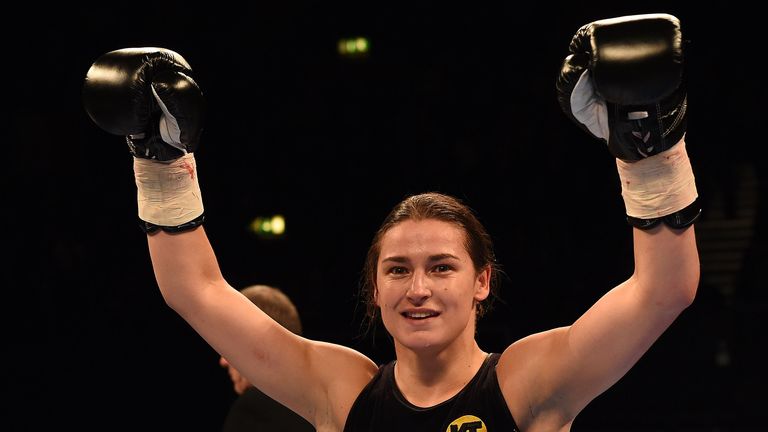 Katie Taylor celebrates her pro debut win
