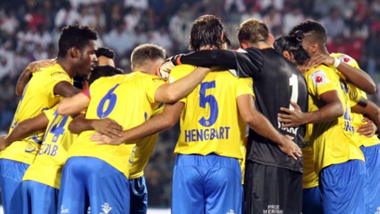 The Kerala Blasters huddle up before kick-off