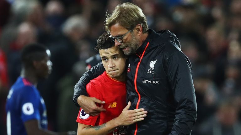 LIVERPOOL, ENGLAND - OCTOBER 17:  Jurgen Klopp, Manager of Liverpool talks with Philippe Coutinho of Liverpool after the Premier League match between Liver