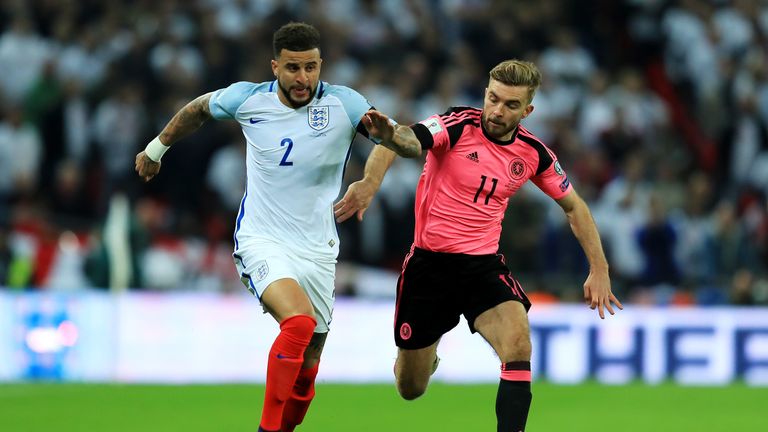 LONDON, ENGLAND - NOVEMBER 11:  Kyle Walker of England and James Morrison of Scotland battle for the ball during the FIFA 2018 World Cup qualifying match b