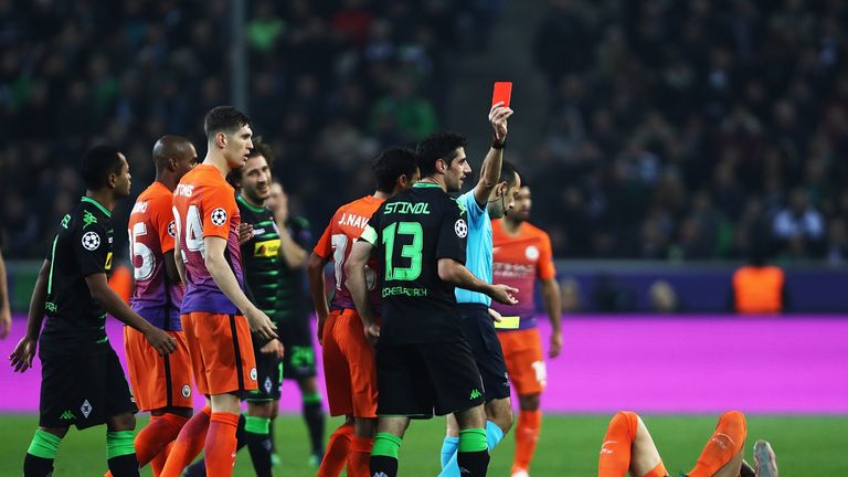 Lars Stindl receives a red card during Borussia Monchengladbach's game with Manchester City