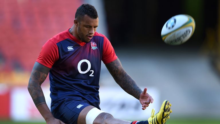 England rugby player Courtney Lawes kicks the ball during the captain's run in Brisbane on June 10, 2016, ahead of the first rugby Test match against Austr