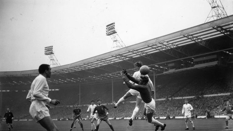 Action from 1965 FA Cup final between Liverpool and Leeds. Liverpool won 2-1 thanks to extra-time winner from Ian St John  