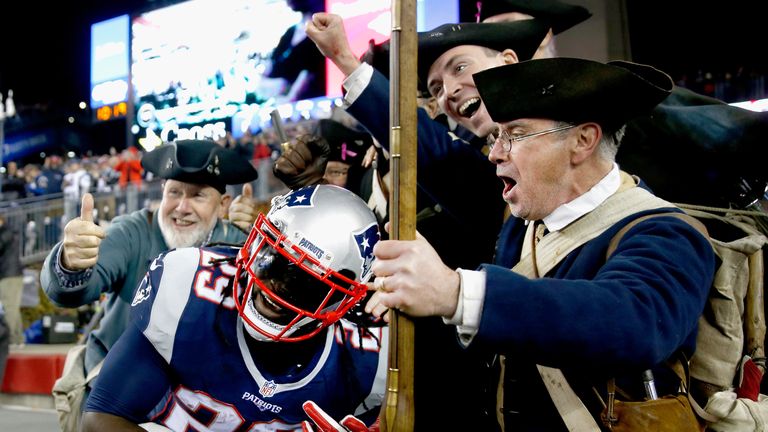 FOXBORO, MA - NOVEMBER 13:  LeGarrette Blount #29 of the New England Patriots reacts with members of the End Zone Militia after carrying the ball for a tou