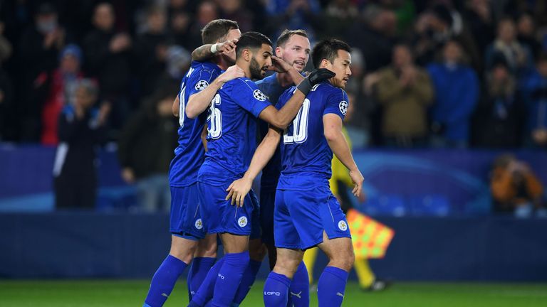 Leicester City midfielder Riyad Mahrez (2L) celebrates scoring his team's second goal