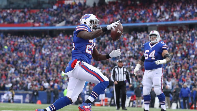 ORCHARD PARK, NY - NOVEMBER 27: LeSean McCoy #25 of the Buffalo Bills celebrates as he scores a touchdown in the second quarter during NFL game action agai