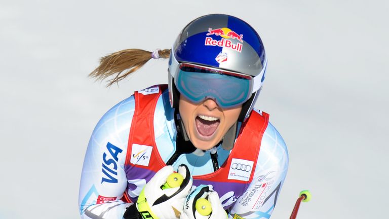 CORTINA D'AMPEZZO, ITALY - JANUARY 23: (FRANCE OUT) Lindsey Vonn of the USA celebrates during the Audi FIS Alpine Ski World Cup Women's Downhill on January