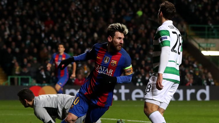 Lionel Messi of Barcelona celebrates scoring his side's first goal against Celtic