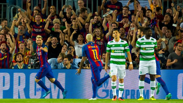 Lionel Messi celebrates after he scores his side's opener against Celtic in September