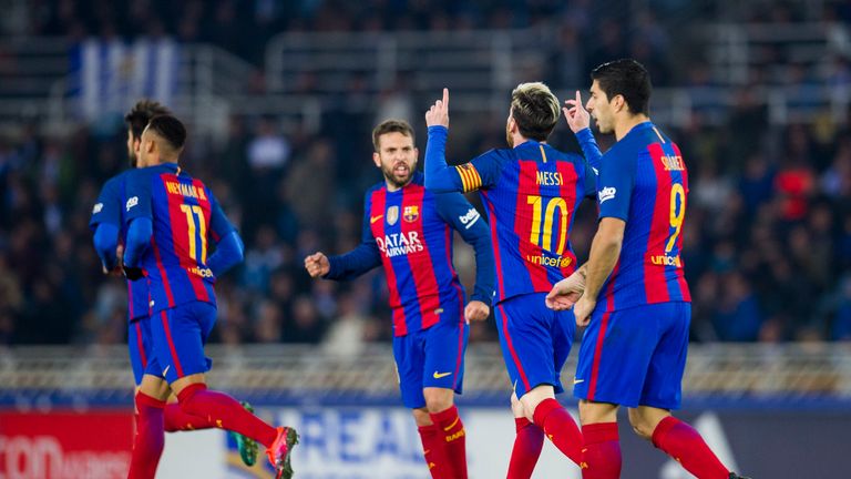 SAN SEBASTIAN, SPAIN - NOVEMBER 27:  Lionel Messi of FC Barcelona celebrates after scoring goal during the La Liga match between Real Sociedad de Futbol an