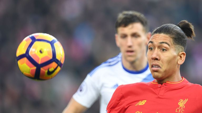 Liverpool's Brazilian midfielder Roberto Firmino eyes the ball during the English Premier League football match between Liverpool and Sunderland at Anfield