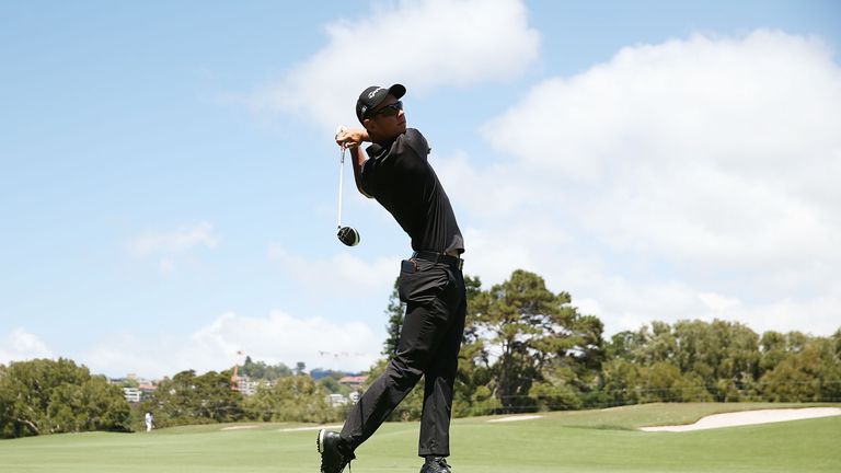 Lucas Herbert of Australia plays an approach shot on the 16th hole during day one of the 2016 Australian Open