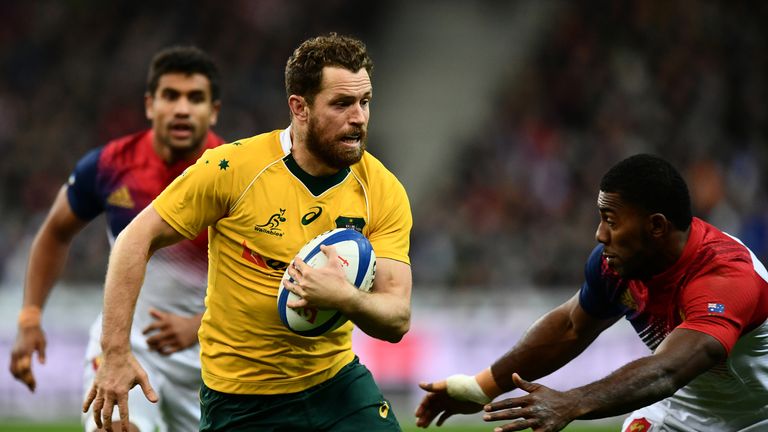 Luke Morahan of Australia makes a break against France