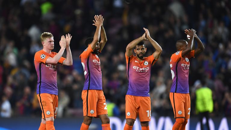 Manchester City players applaud the travelling fans following the UEFA Champions League group C match 