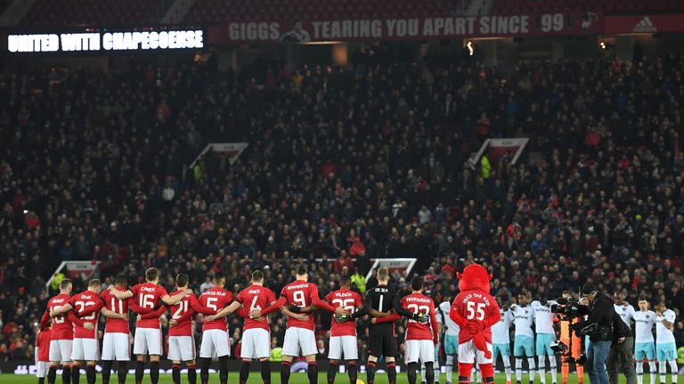 Both teams observe a minute's silence ahead of the EFL Cup match between Manchester United and West Ham 