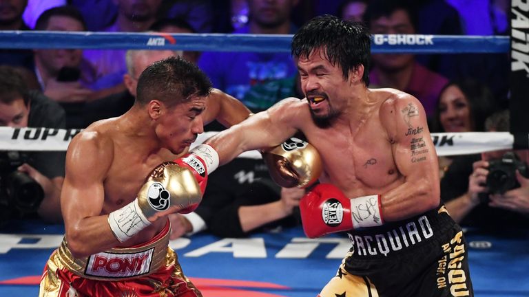 LAS VEGAS, NV - NOVEMBER 05:  Jessie Vargas (L) and Manny Pacquiao battle in the third round of their WBO welterweight championship fight at the Thomas & M