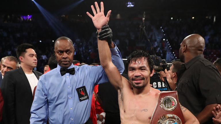 Manny Pacquiao of the Philippines poses after his unanimous-decision victory over Jessie Vargas at the Thomas & Mack Center 