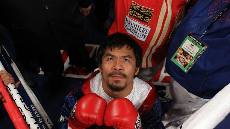 LAS VEGAS - NOVEMBER 14:  Manny Pacquiao prays in the ring before taking on Miguel Cotto during their WBO welterweight title fight at the MGM Grand Garden 