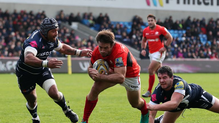 SALFORD, ENGLAND - NOVEMBER 20: Marcelo Bosch of Saracens goes over for a try during the Aviva Premiership match between Sale Sharks and Saracens at the AJ