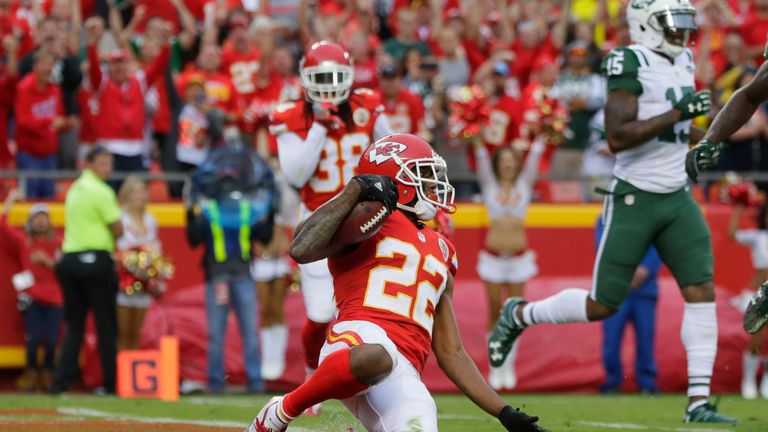 KANSAS CITY, MO - SEPTEMBER 25:  Cornerback Marcus Peters #22 of the Kansas City Chiefs slides down in the end zone after intercepting his second pass agai