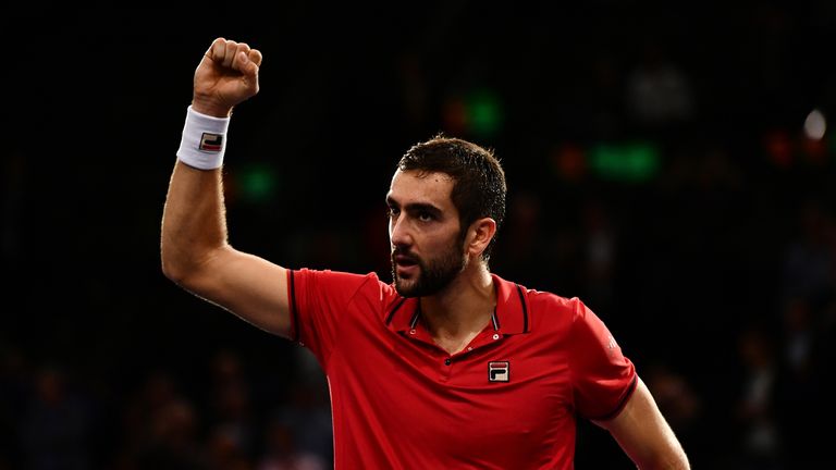 PARIS, FRANCE - NOVEMBER 04:  Marin Cilic of Croatia celebrates victory over Novak Djokovic of Serbia during the Mens Singles quarter final match on day fi