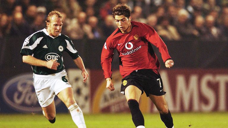 Cristiano Ronaldo of Manchester United takes on football-ace-turned-Breeders' Cup trainer, Markus Munch, then playing for Panathinaikos in 2003.