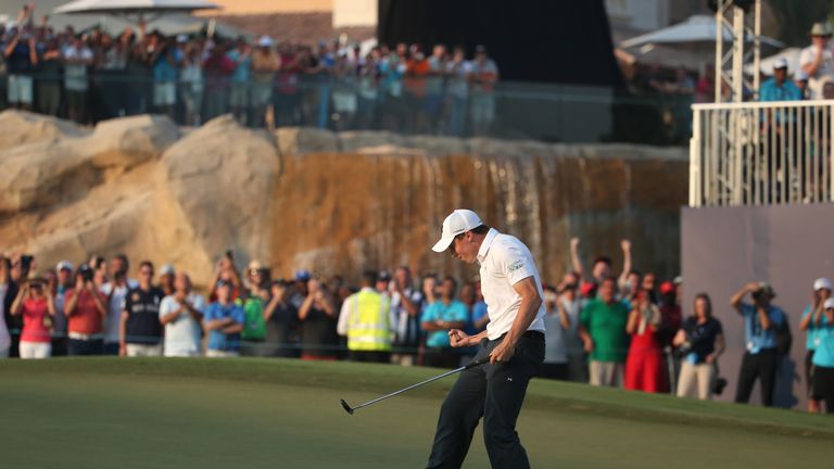 Matt Fitzpatrick of England celebrates holing the winning putt on the 18th green during day four of the DP World Tour Championship