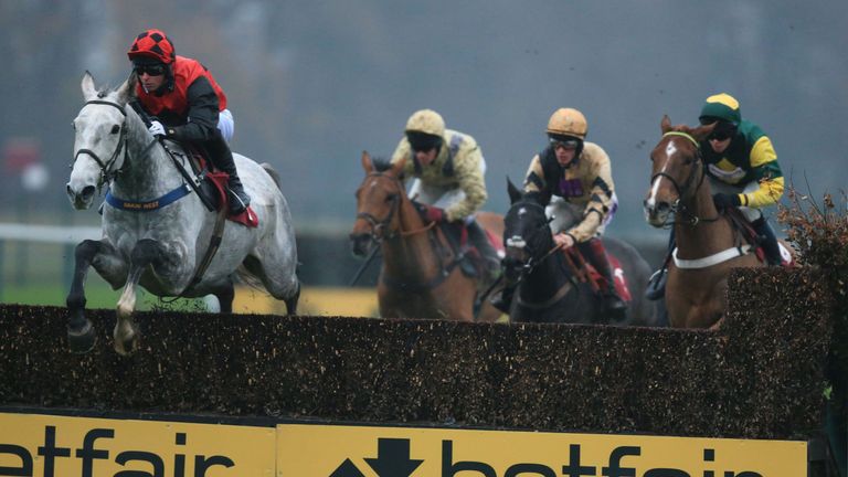 Maximiser (left), ridden by Joe Colliver, wins The Wingate Signs Supports & Superjosh Charity 'Fixed Brush' 'National Hunt' Novices' Hurdle at Haydock 