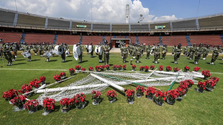 Members of the Colombian Army take part in a tribute to the victims of a plane crash in the Colombian mountains that killed 71 and virtually wiped out the 