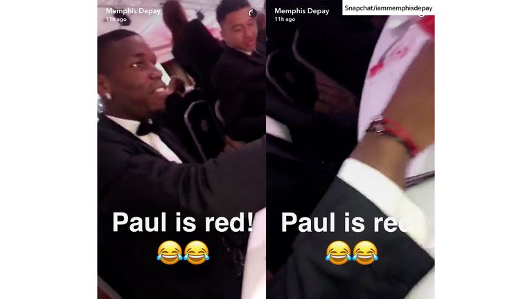 Memphis Depay plays with Snapchat during the United for UNICEF gala dinner at Old Trafford